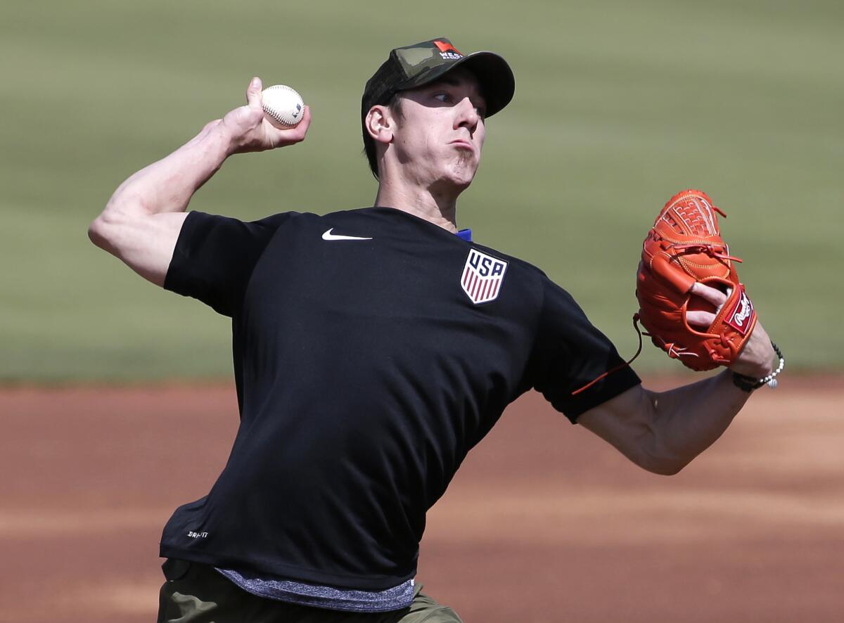 Pitcher Tim Lincecum throws for MLB baseball scouts on May 6 in Scottsdale, Ariz.
