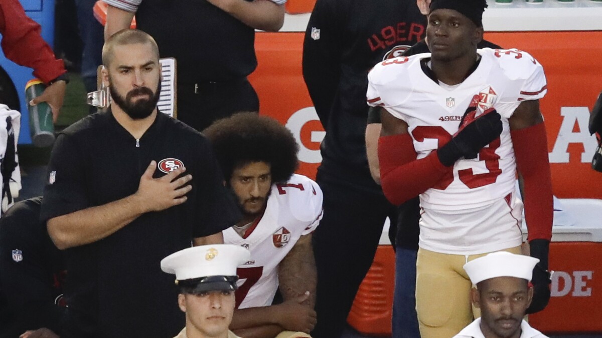 Colin Kaepernick Takes A Knee During National Anthem In San Diego And Is Booed Los Angeles Times