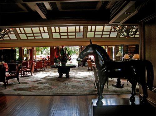 A wooden horse greets guests in the foyer of the Four Seasons Resort Lanai, the Lodge at Koele. Once a pineapple plantation, Lanai is now a luxurious place to kick back and enjoy the Hawaiian islands natural beauty.