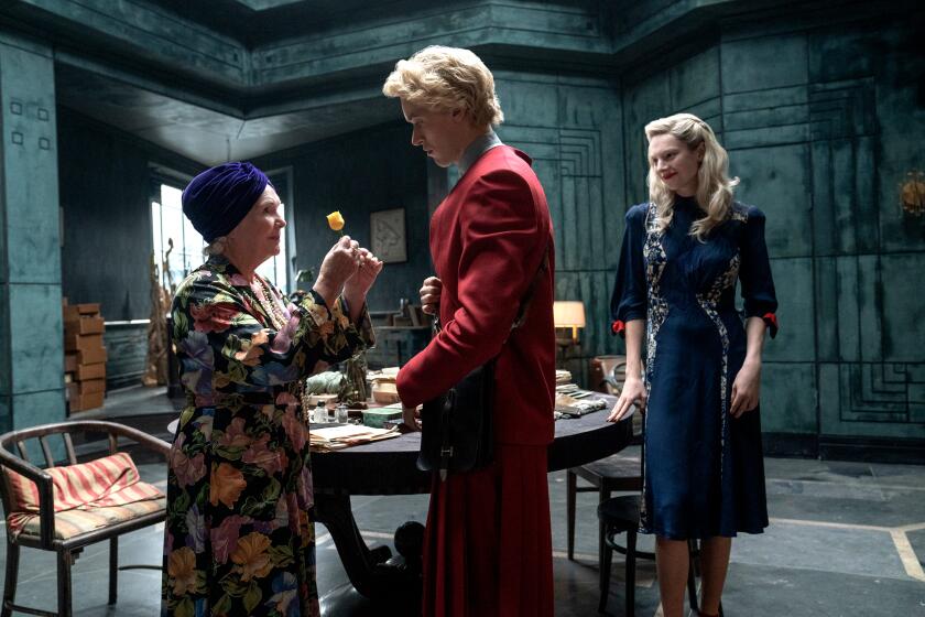 Fionnula Flanagan as Grandma'am, Tom Blyth as Coriolanus Snow and Hunter Schafer as Tigris Snow in The Hunger Games: The Ballad of Songbirds and Snakes. Photo Credit: Murray Close