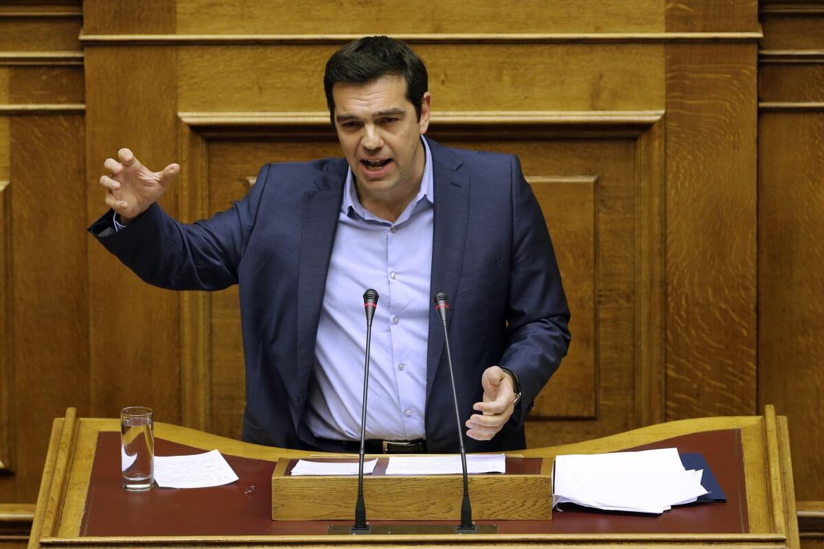 Greek Prime Minister Alexis Tsipras speaks Thursday at an emergency Parliament session in Athens.