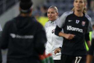 LOS ANGELES, CALIFORNIA - OCTOBER 02: Interim head coach Becki Tweed (C) of Angel City FC.