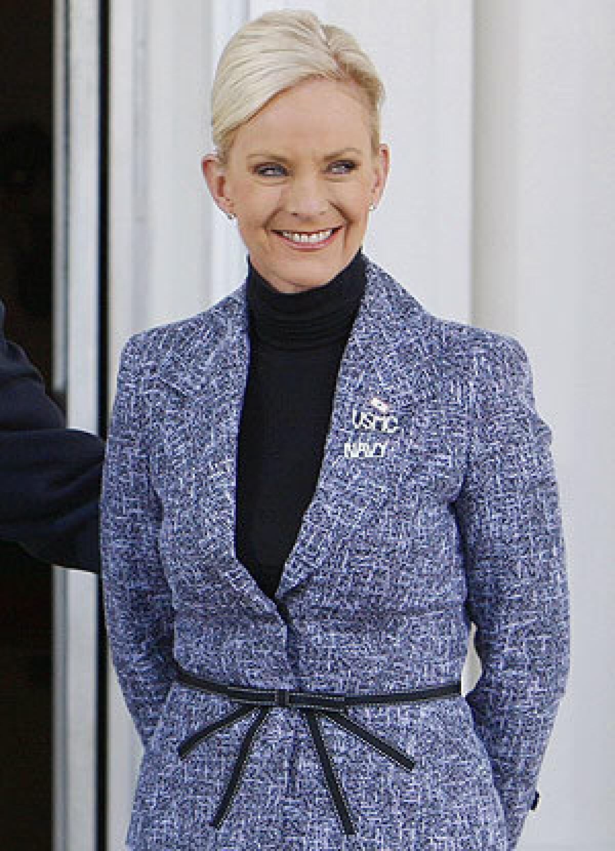 Cindy McCain lets her lapel do the talking.
