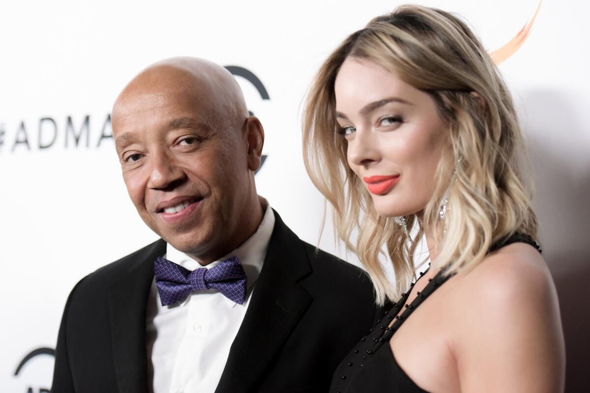 Russell Simmons, left, and Lucy McIntosh attend the 2016 All Def Movie Awards held at Lure in Los Angeles.