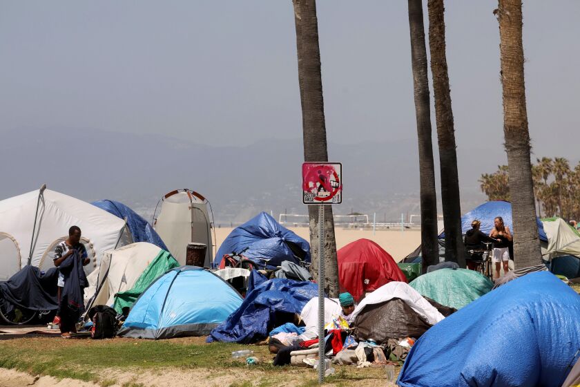 VENICE, CA - APRIL 16, 2021 - - A sea of homeless tents takes over an area between the bike path and Ocean Front Walk in Venice on April 16, 2021. (Genaro Molina / Los Angeles Times)