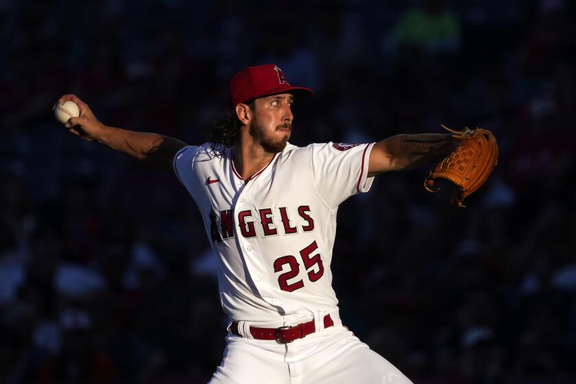 Los Angeles Angels starting pitcher Michael Lorenzen throws to the plate during the second inning of a baseball game against the Seattle Mariners Friday, June 24, 2022, in Anaheim, Calif. (AP Photo/Mark J. Terrill)