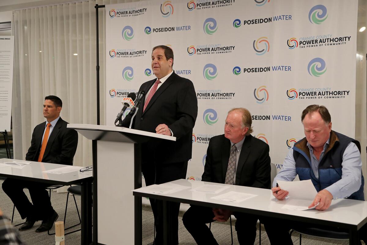 Brian Probolsky, Orange County Power Authority chief executive, speaks during a signing ceremony in Irvine.