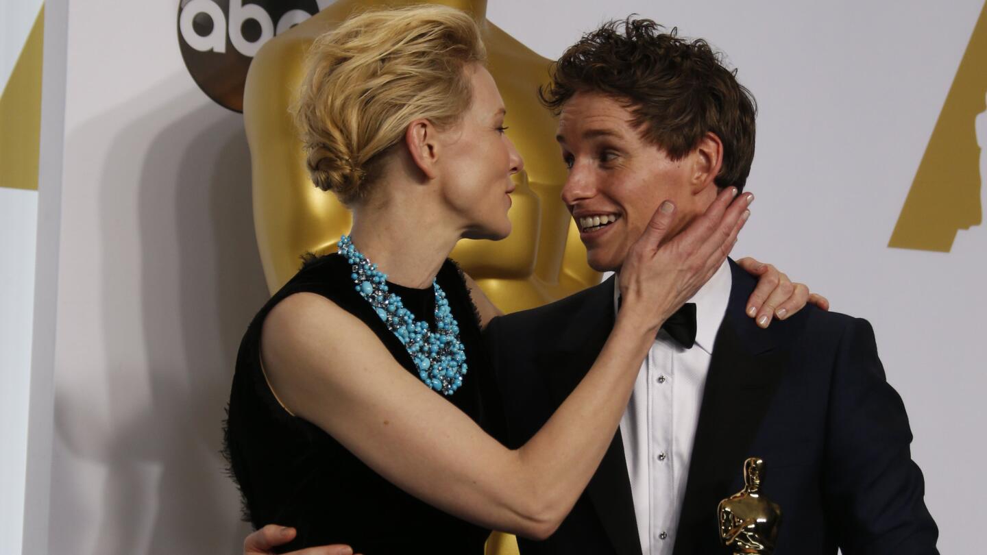 Oscars 2015 winners' room | Eddie Redmayne with presenter Cate Blanchett
