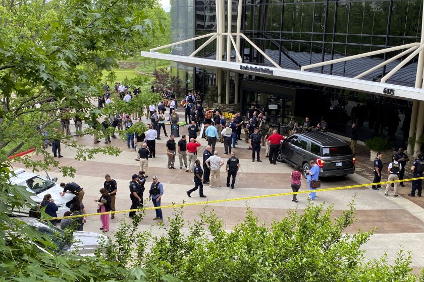 Emergency personnel respond to a shooting at the Natalie Medical Building on the St. Francis Hospital campus Wednesday, June 1, 2022, in Tulsa, Okla. (Ian Maule/Tulsa World via AP)