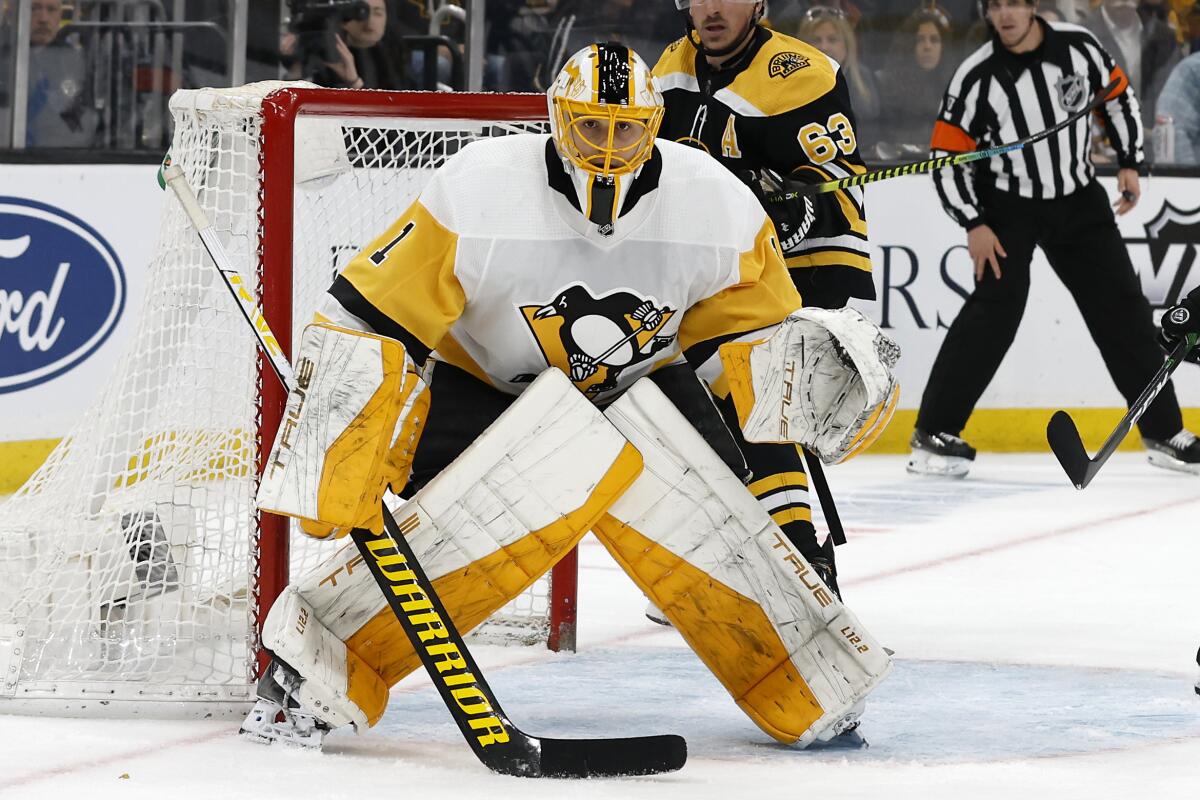 FILE - Pittsburgh Penguins goaltender Casey DeSmith plays during the first period of an NHL hockey game against the Boston Bruins, Saturday, April 16, 2022, in Boston. The Penguins are sticking with Casey DeSmith, signing the team's No. 2 goaltender to a two-year contract extension on Tuesday, July 5, 2022, that carries an average annual value of $1.8 million.(AP Photo/Winslow Townson, File)