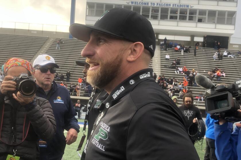 Mike Moon of Oxnard Pacifica is The Times' coach of the year after guiding the Tritons to their first Southern Section Division 5 title and a CIF state championship Division 2-A bowl victory.