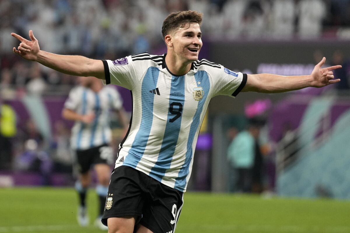 Argentina's Julian Alvarez celebrates his side's second goal during the World Cup round of 16 soccer match between Argentina and Australia at the Ahmad Bin Ali Stadium in Doha, Qatar, Saturday, Dec. 3, 2022. (AP Photo/Frank Augstein)
