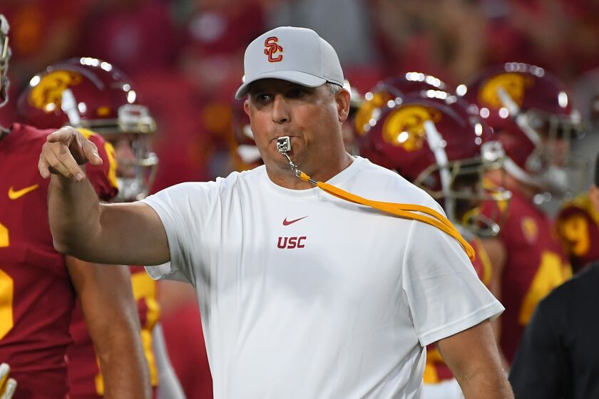 LOS ANGELES, CA - SEPTEMBER 07: Head coach Clay Helton of the USC Trojans instructs his team in the game against the Stanford Cardinal at the Los Angeles Memorial Coliseum on September 7, 2019 in Los Angeles, California. (Photo by Jayne Kamin-Oncea/Getty Images)
