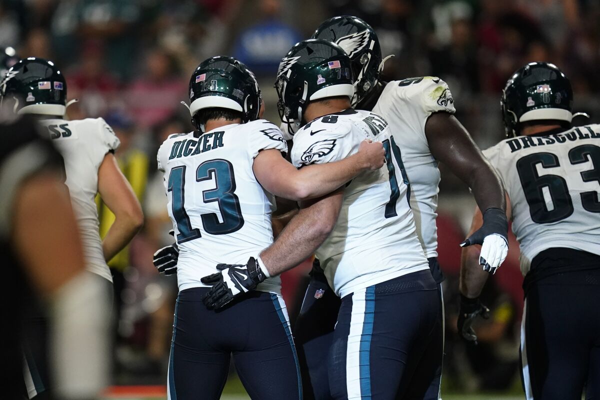 Cameron Dicker (13) is congratulated after making a game-winning field goal for the Philadelphia Eagles.