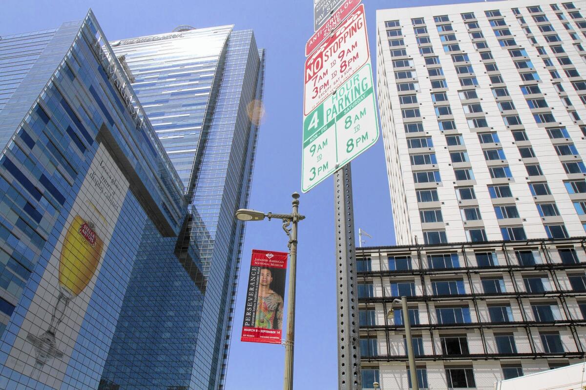 The Marriott Courtyard and Marriott Residence Inn stand next to the JW Marriott hotel at L.A. Live; EB-5 funds were used in the hotel's construction.