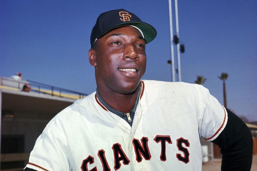 San Francisco Giants' Willie McCovey poses.