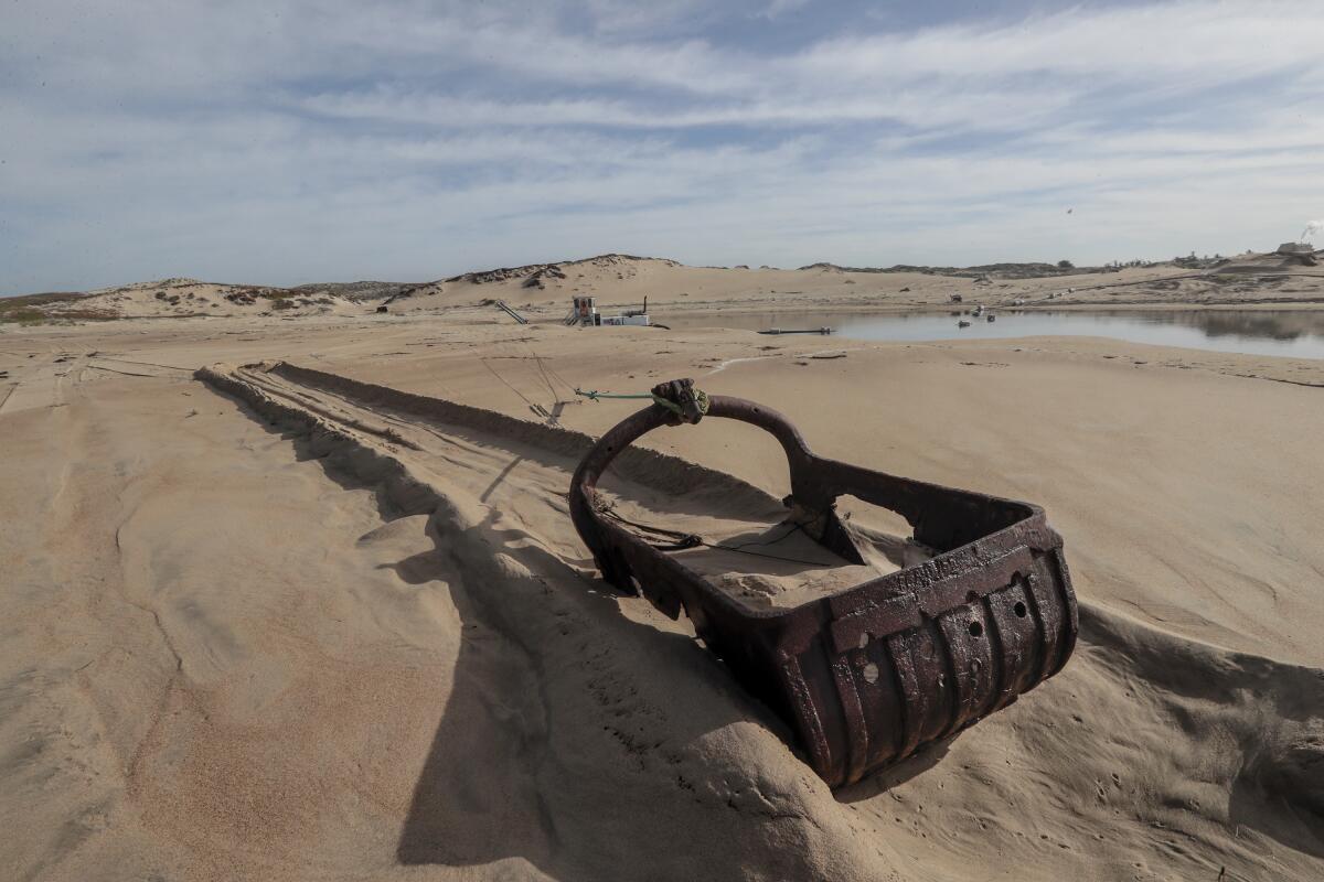 Idle dredging equipment on the beach