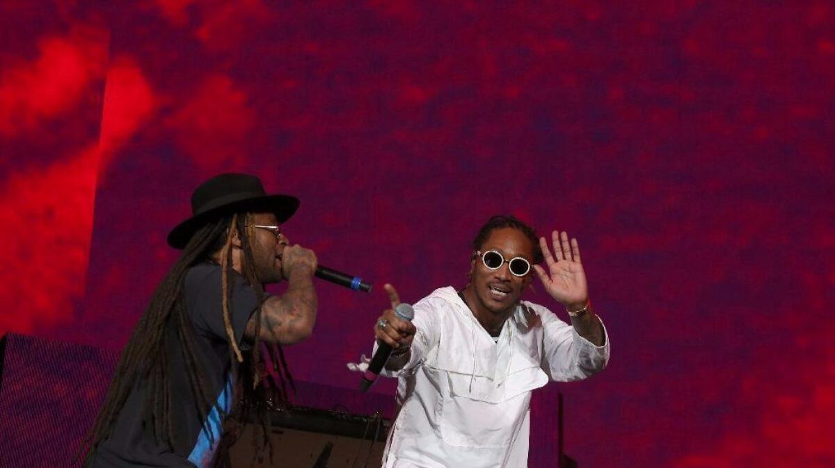 Ty Dolla Sign, left, and Future perform at Coachella. (Luis Sinco / Los Angeles Times)