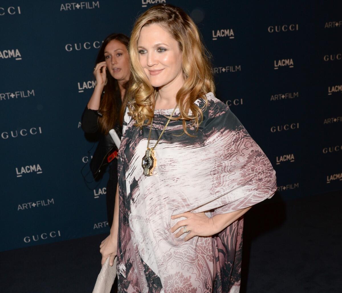 Drew Barrymore is pregnant with her second child and is decidedly more open about maternity this time around.