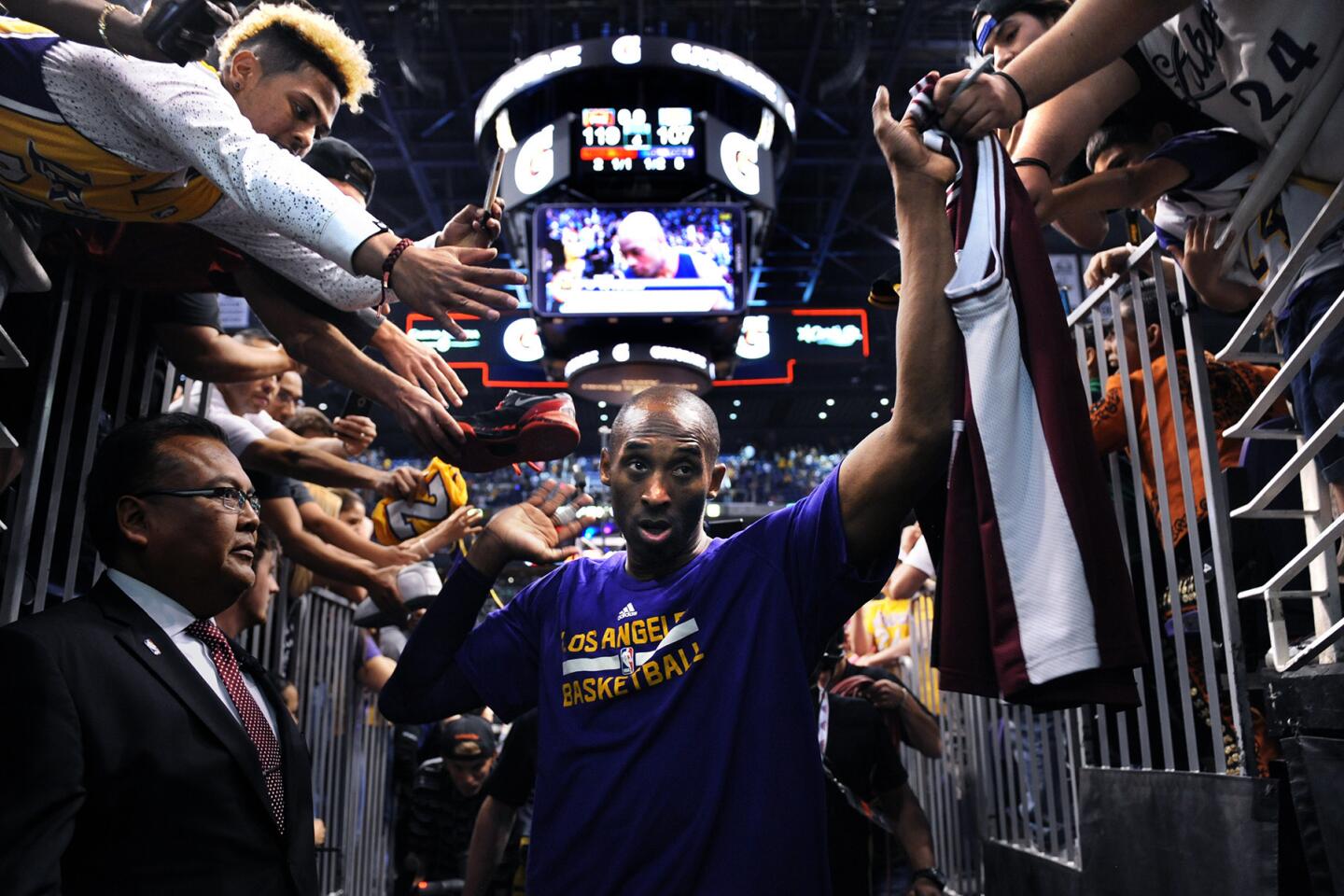 Lakers Kobe Bryant walks off the court for the last time after a game agianst the Suns in Phoenix on March 23.
