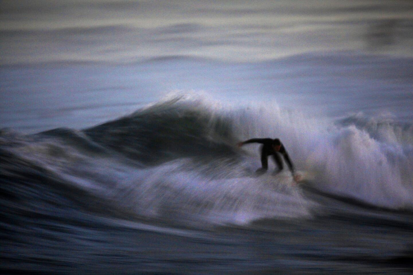 Surfing at nightfall