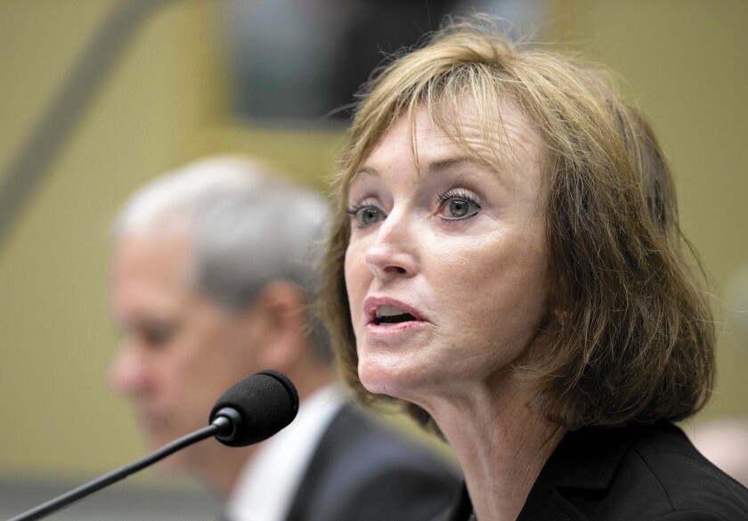 Marilyn Tavenner, head of the federal Centers for Medicare and Medicaid Services, testifies at a House Oversight and Government Reform Committee hearing in Washington.