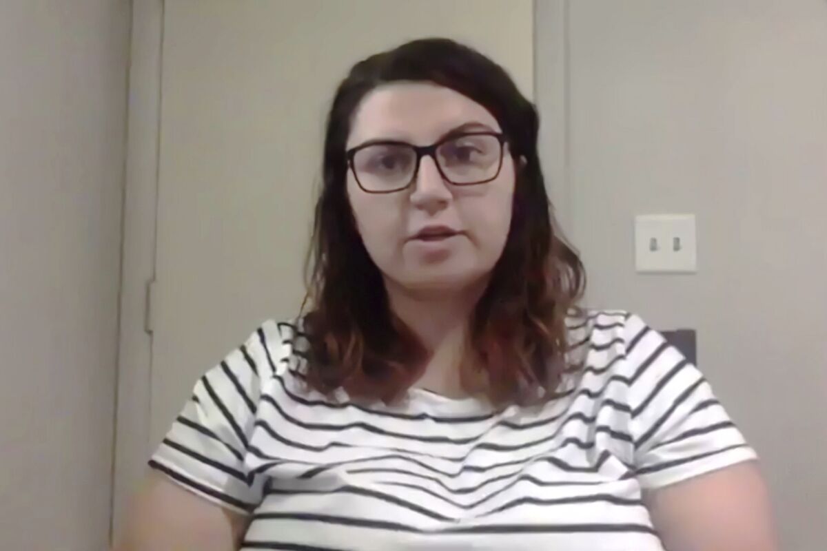 FILE - This Thursday, May 20, 2021, image from video shows Madison Smith during an interview in Lindsborg, Kan. A grand jury that was convened by a Kansas woman who said she was raped has declined to file charges in the case. Madison Smith, of McPherson, used a 134-year-old state law to call the grand jury after a county prosecutor declined to file rape charges against a man who Smith said raped her at Bethany College in 2018.(AP Photo/Heather Hollingsworth File)