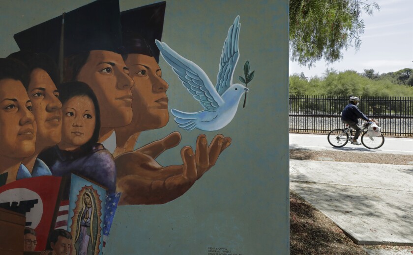 A mural by artist Ignacio Gomez stands adjacent to the Mission City Trail along the San Fernando Road bike path.