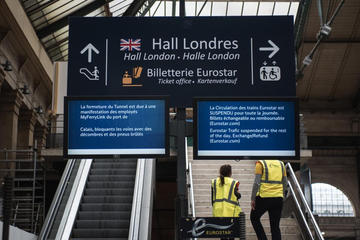 An information board shows that Eurostar trains are suspended for the rest of the day at Gare du Nord station in Paris on June 23, 2015.