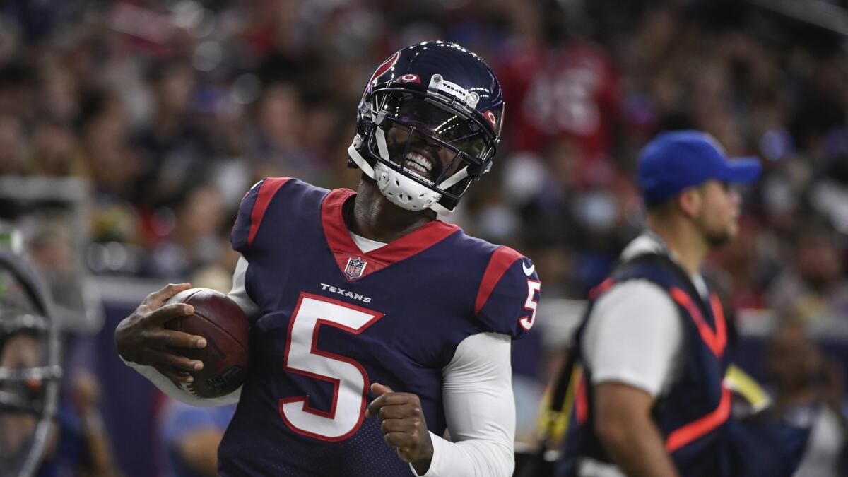 Houston Texans quarterback Tyrod Taylor  rushes against the Tampa Bay Buccaneers in a preseason game.