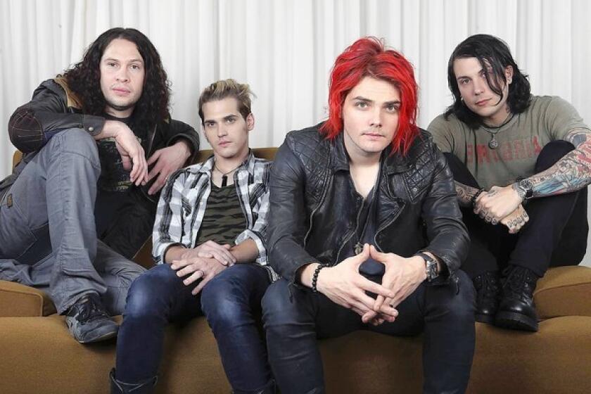 ALTER EGOS: My Chemical Romance members Ray Toro, left, Mikey Way, Gerard Way and Frank Iero (here as themselves) are also the Fabulous Killjoys.