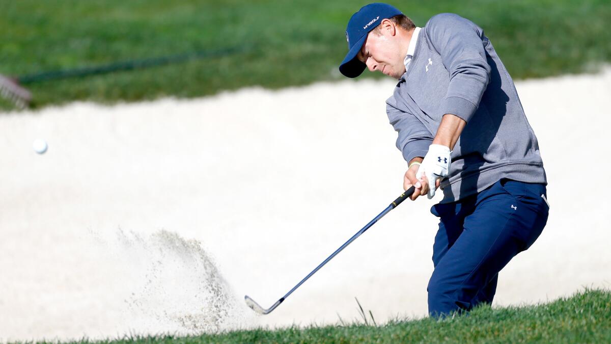 Jordan Spieth hits from a greenside bunker at No. 6 during the third round of the AT&T Pebble Beach Pro-Am on Saturday.