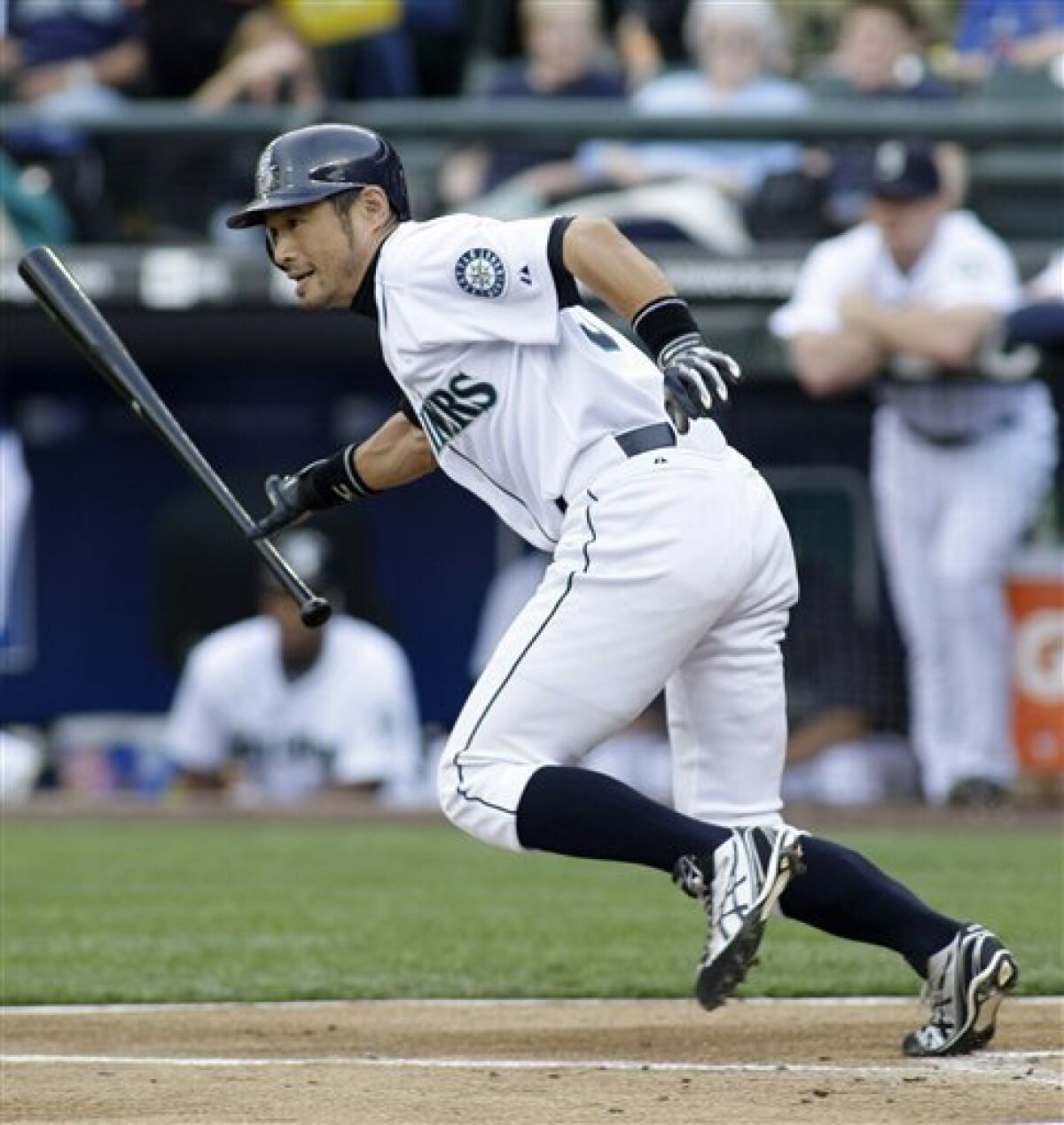 Seattle Mariners' Ichiro Suzuki heads for first base after hitting a single in the first inning of a baseball game against the Baltimore Orioles, Tuesday, June 2, 2009, at Safeco Field in Seattle. The hit set a Mariners franchise hitting streak record at .26. (AP Photo/Ted S. Warren)