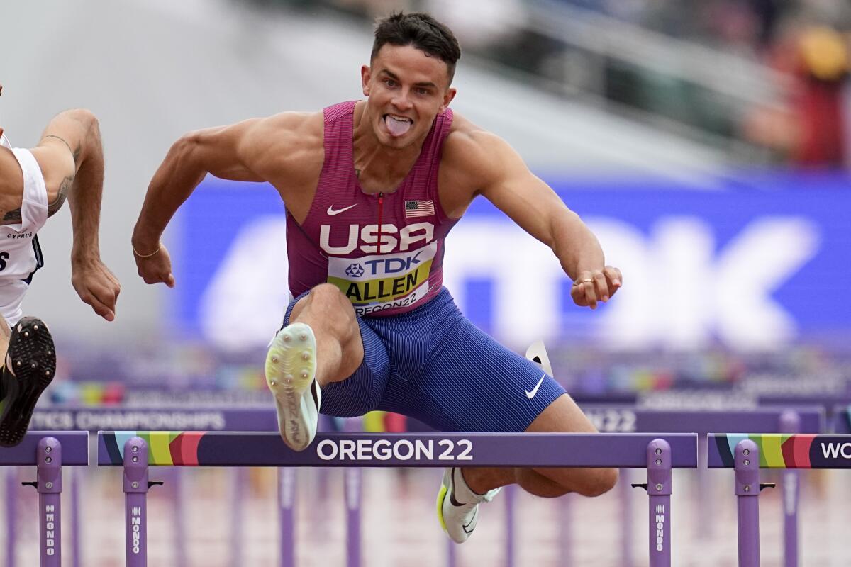 Devon Allen competes in a 110-meter hurdles heat at the track and field world championships in Eugene, Ore.