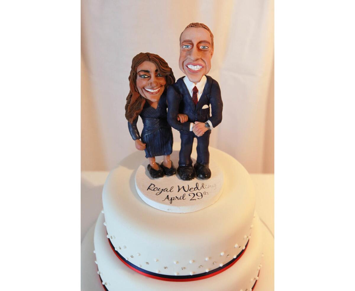 April 21, 2011: A cake featuring figurines of Prince William and Kate Middleton is displayed at an exhibition of Royal Wedding cakes.