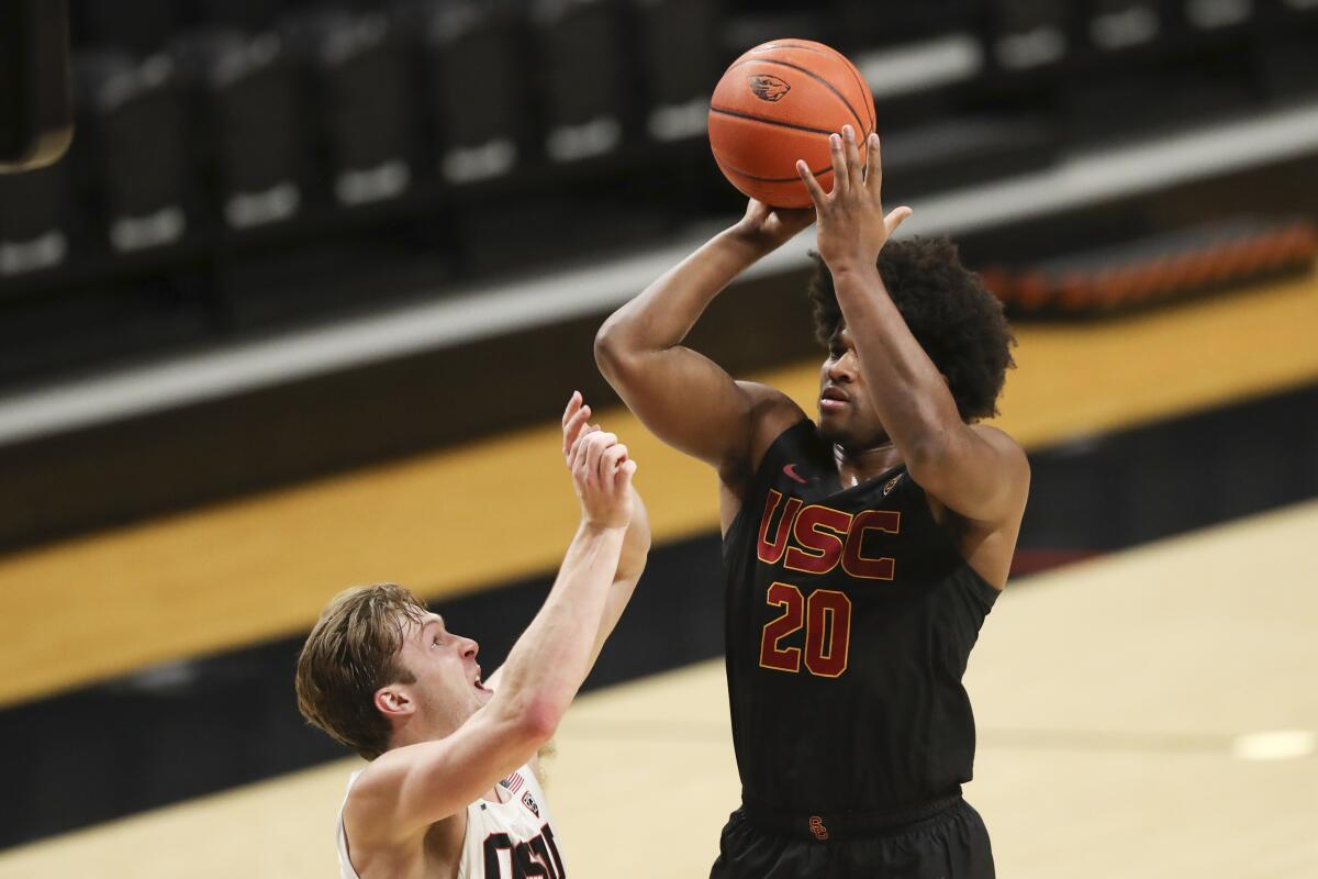 USC's Ethan Anderson shoots over Oregon State's Zach Reichle.