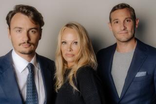 LOS ANGELES, CA - MAY 14: Producer Brandon Thomas Lee, Pamela Anderson and director Ryan White photographed in Los Angeles, CA on May 14, 2023. (Elizabeth Weinberg / For The Times)