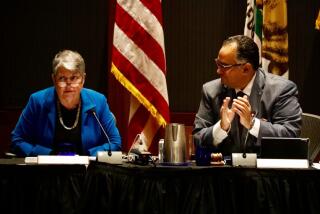 University of California President Janet Napolitano, left, 20th president of the University of California, announces she is stepping down as chairman of the board John Perez, right, leads audience in applause on September 18, 2019