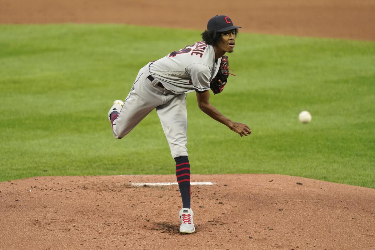Cleveland Indians starting pitcher Triston McKenzie throws during the first inning of a baseball game against the Kansas City Royals Thursday, Sept. 2, 2021, in Kansas City, Mo. (AP Photo/Charlie Riedel)