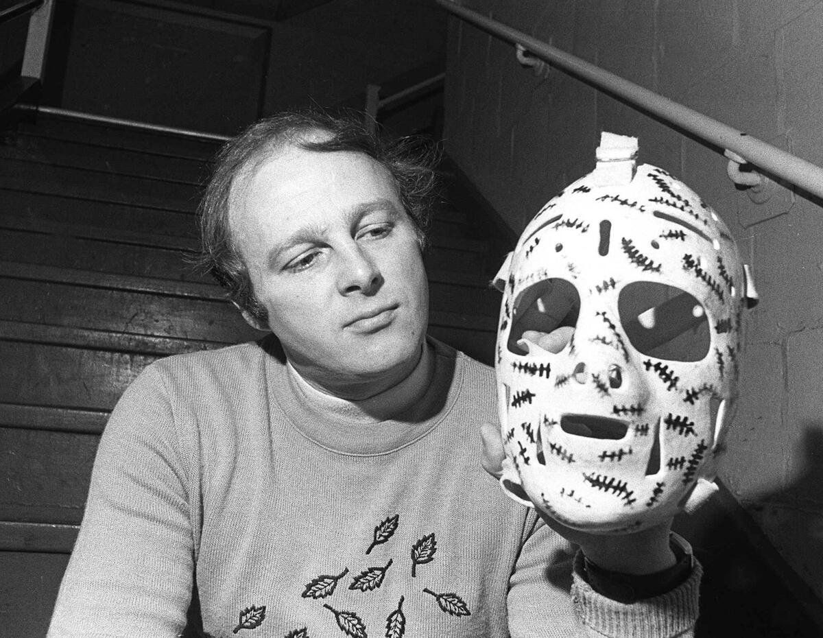 Boston Bruins goalie Gerry Cheevers shows off his now legendary mask in May 1976.