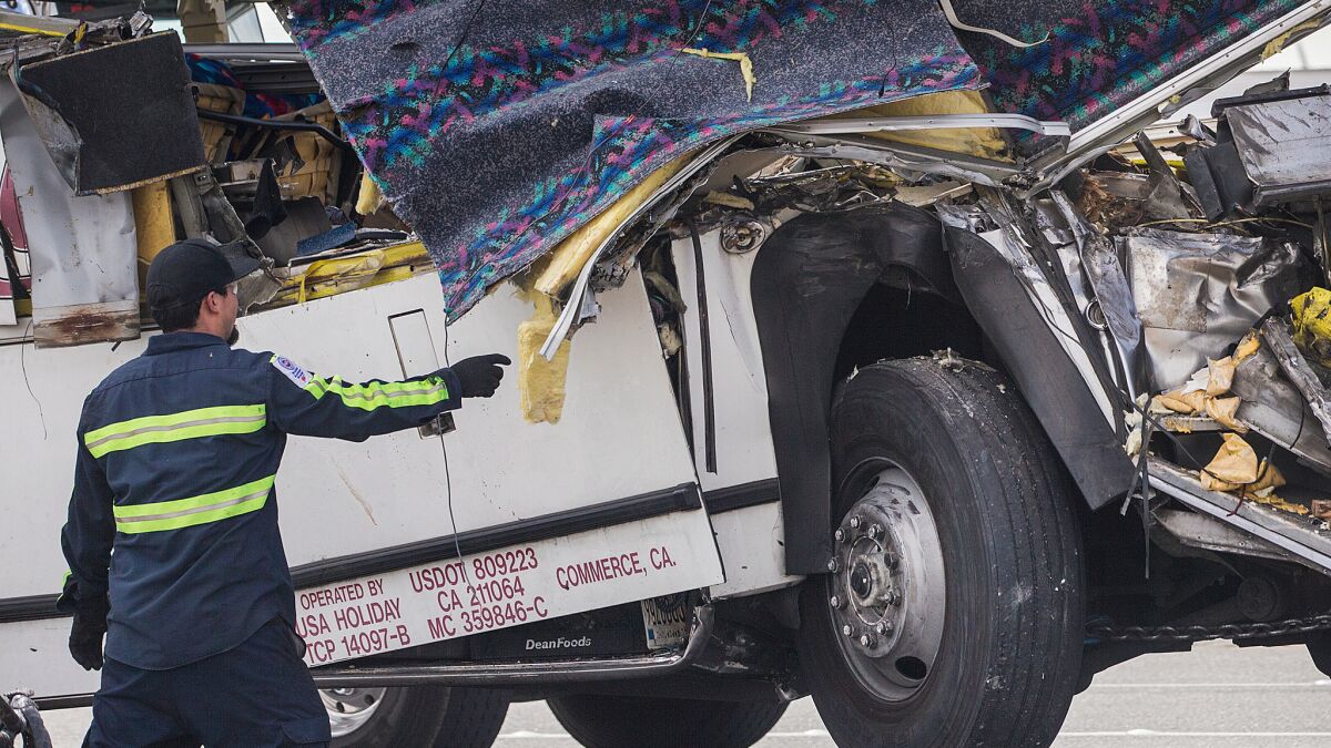 The tread on the front tire of a tour bus involved in a deadly crash is visibly thin and cracked.