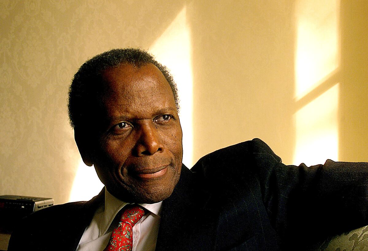 Sidney Poitier in a shirt and tie