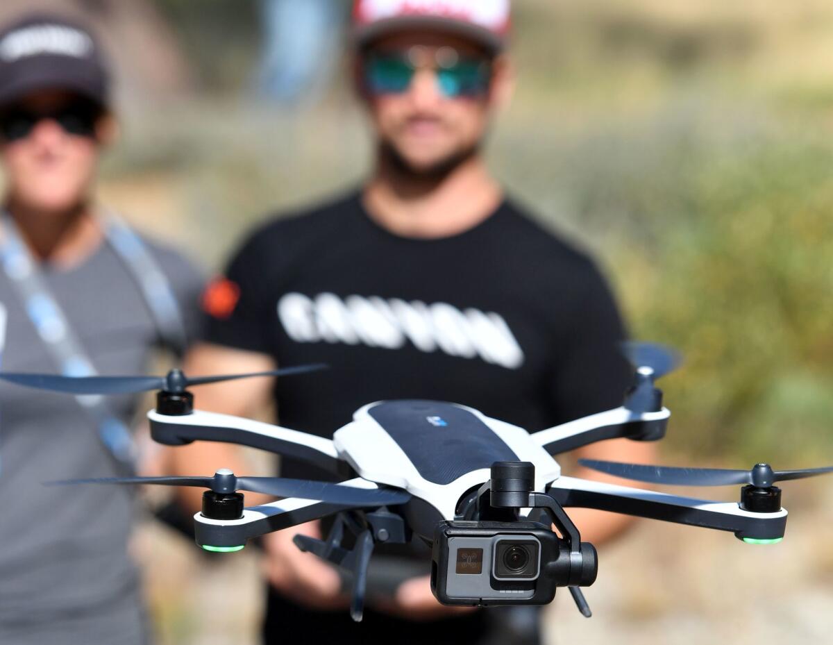 Darren Berreclota, right, pilots a GoPro Karma drone during a media event in Olympic Valley, California on Sept. 19.