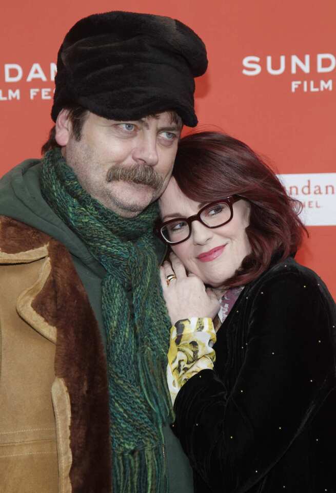 Husband and wife Nick Offerman and Megan Mullally cozy up at the premiere of their film "Smashed."