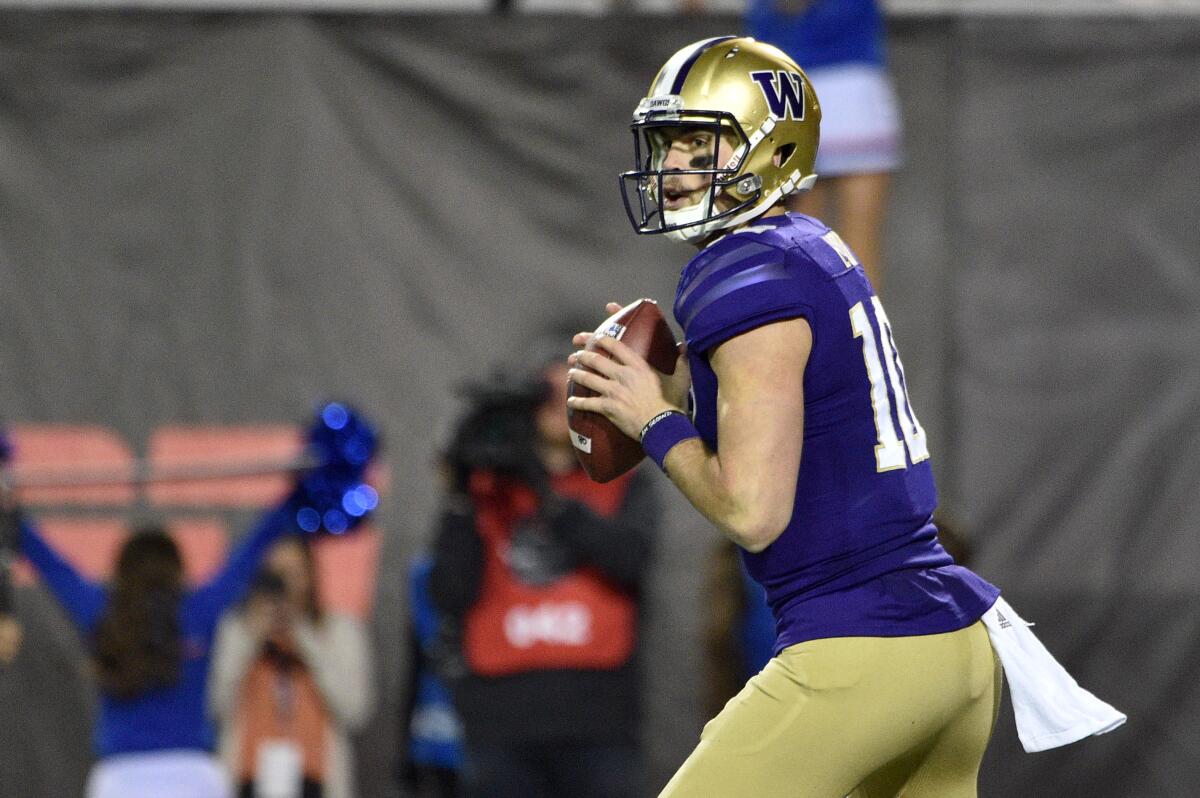 Washington's Jacob Eason looks to pass during the Las Vegas Bowl on Dec. 21, 2019.