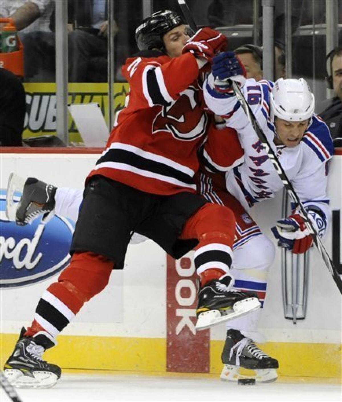 New York Rangers left wing Sean Avery, left, and New Jersey Devils
