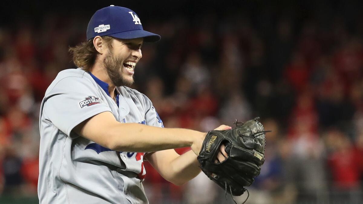 Clayton Kershaw is overjoyed after the Dodgers defeated the Washington Nationals in Game 5 of the National division series on Oct. 13, 2016.
