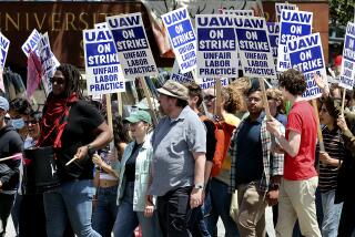 University of California, Santa Cruz graduate students and other academic workers in the UAW 4811 union begin a strike and are joined by UCSC students for Justice in Palestine as they picket the main entrance to campus on Monday, May 20, 2024, in Santa Cruz, Calif. (Shmuel Thaler/The Santa Cruz Sentinel via AP)