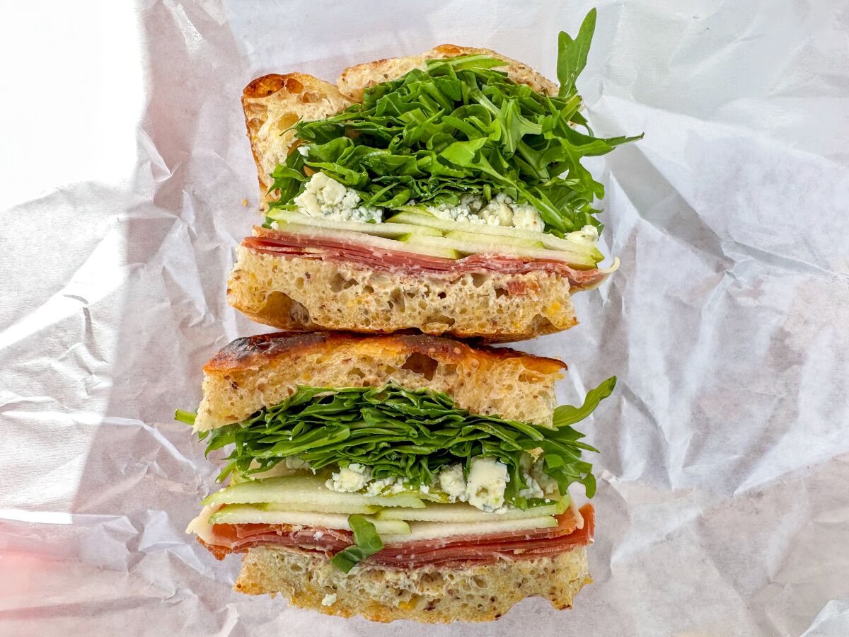 The "Yogi Pear" with jamon serrano, pear, Gorgonzola and arugula at Monroe Place in Culver City.