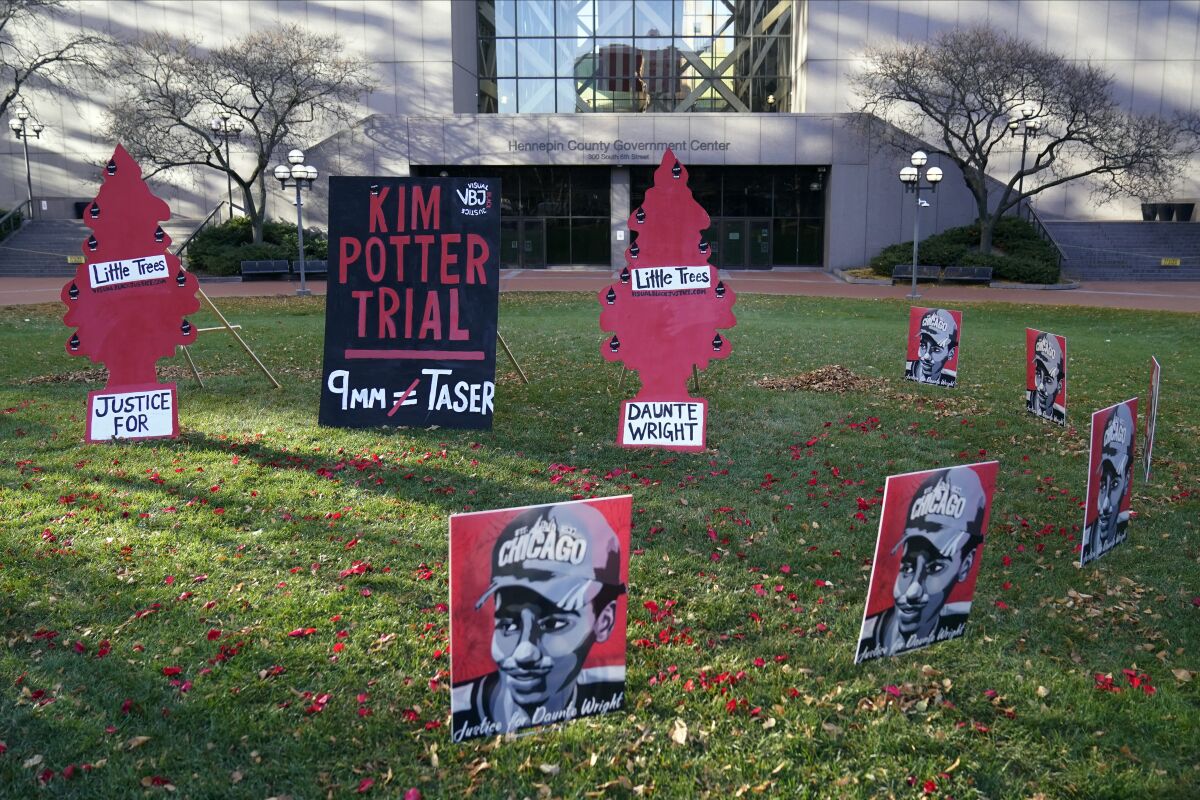 Posters on lawn outside courthouse